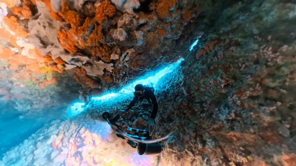 Experienced divers navigating currents in Central Raja Ampat