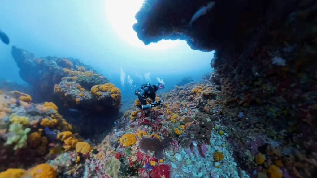 scuba diver drifting in strong current komodo national park