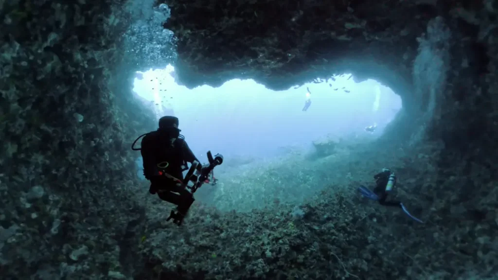 Large deep overhangs and caverns at Police Corner dive site in Komodo National Park