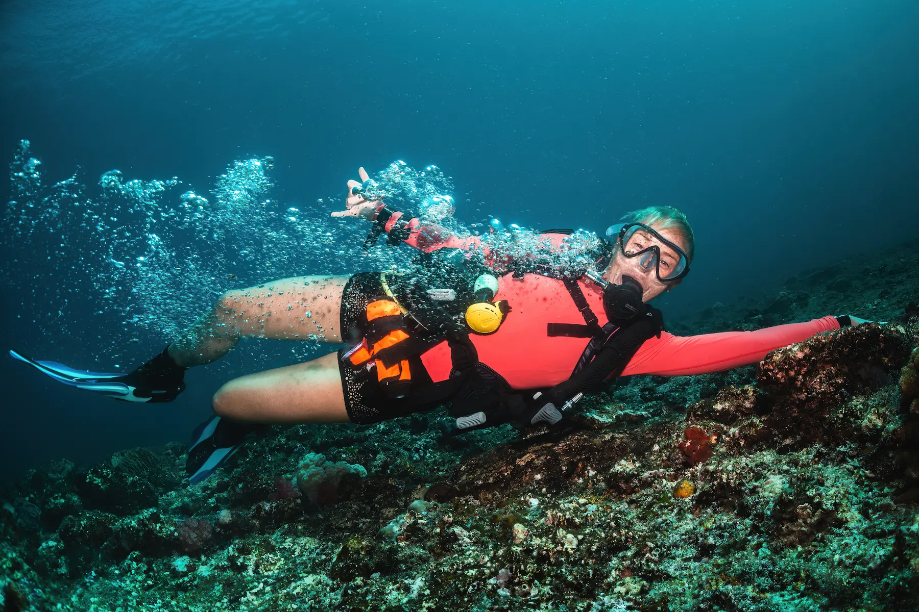 Divers drifting through The Cauldron and Shotgun channel in Komodo