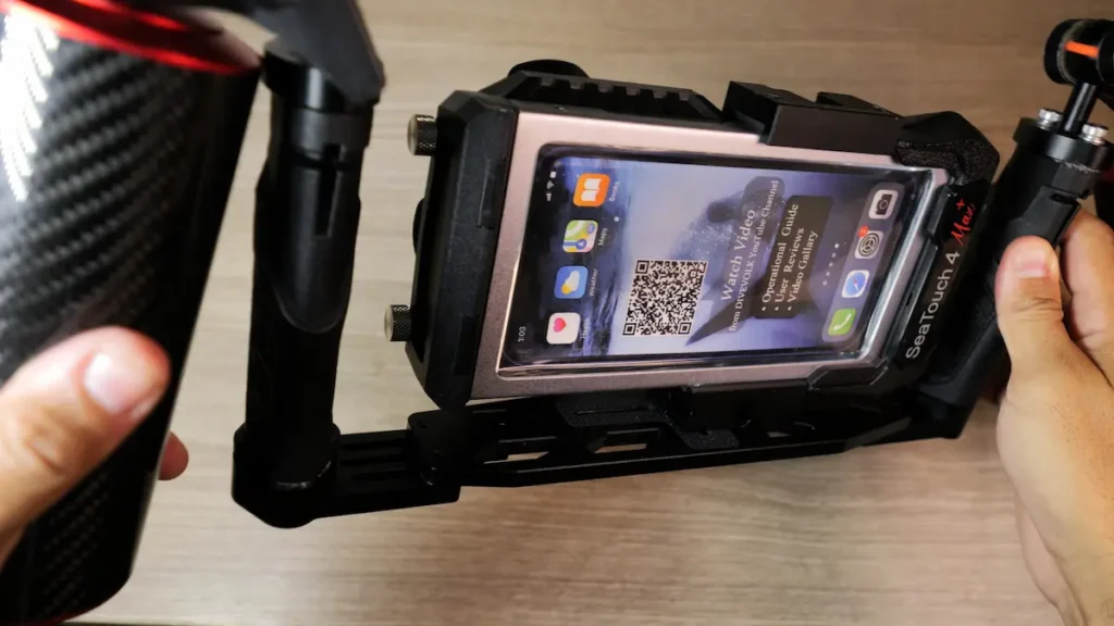Divevolk SeaTouch 4 Max Plus housing showing the flexible touchscreen membrane used to operate a smartphone underwater